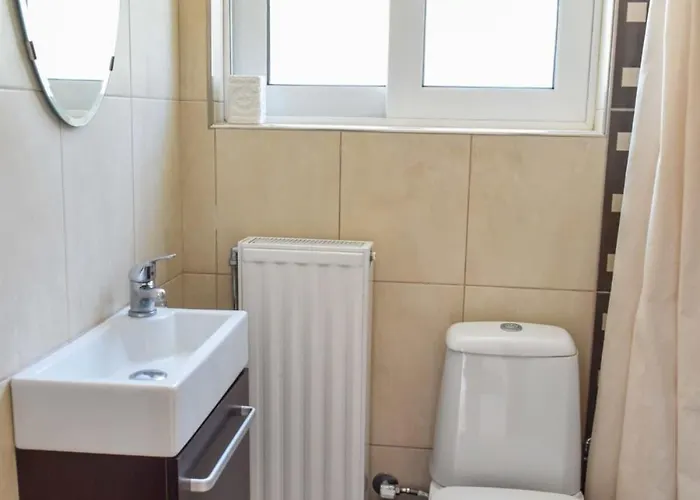 Beachfront Rio Escape - Luxurious Coastal Retreat Патра